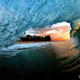 Illustration for article titled Extremely dangerous lava surf photography is completely worth the risk